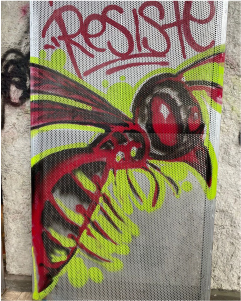 Grafiti de avispa en pro de resistencia.